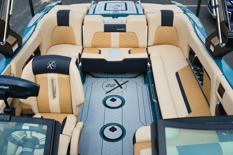 Slide: The Image of Interior of 2025 MasterCraft X22 with luxurious seating. - 11