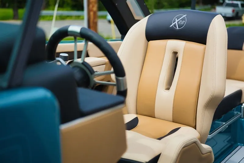 Slide: The Image of Interior of 2025 MasterCraft X22 with luxurious seating. - 12