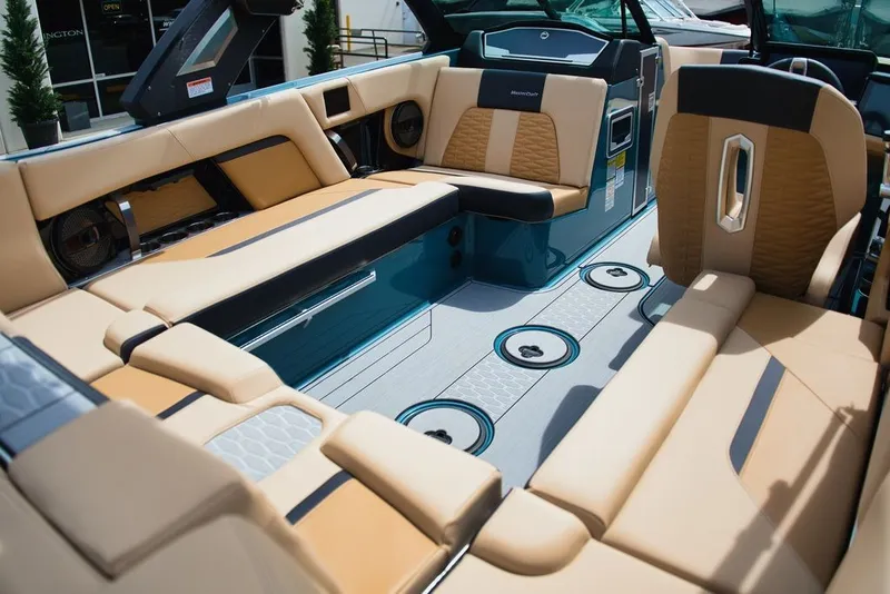 Slide: The Image of 2025 MasterCraft X22 interior with luxurious seating. - 14