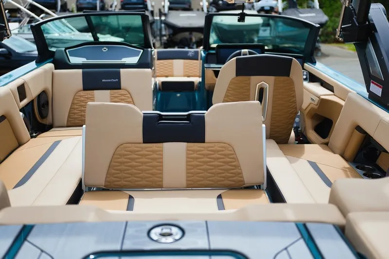 Slide: The Image of Interior of 2025 MasterCraft X22 with luxurious upholstery. - 18