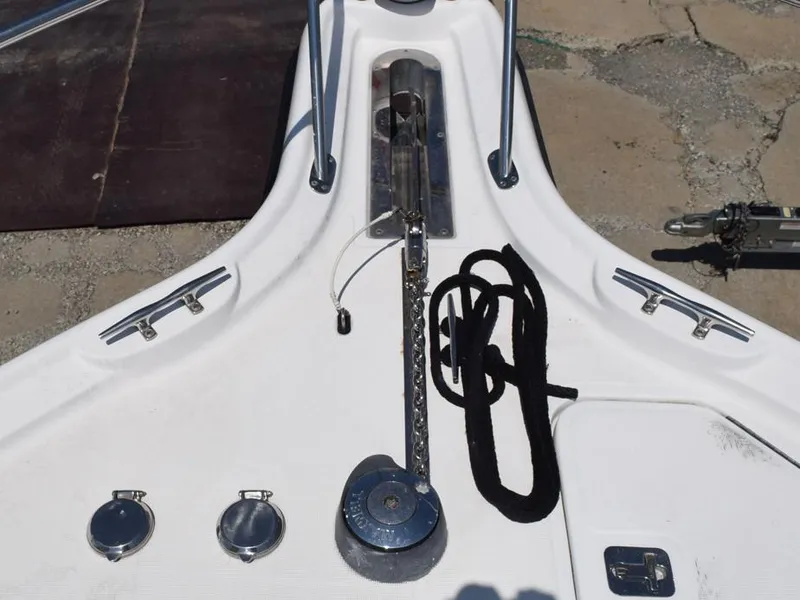 Slide: The Image of 2006 Tiara Yachts 3200 Open bow with anchor chain and cleats. - 14