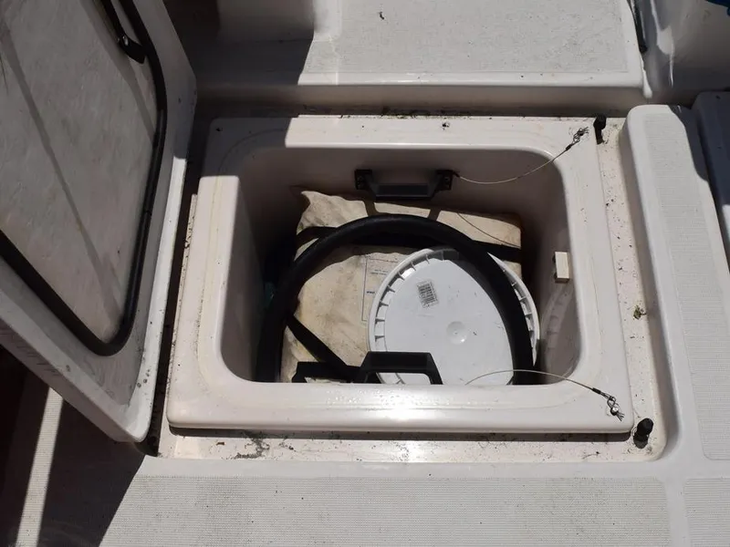 Slide: The Image of Storage compartment on a 2006 Tiara Yachts 3200 Open boat. - 35