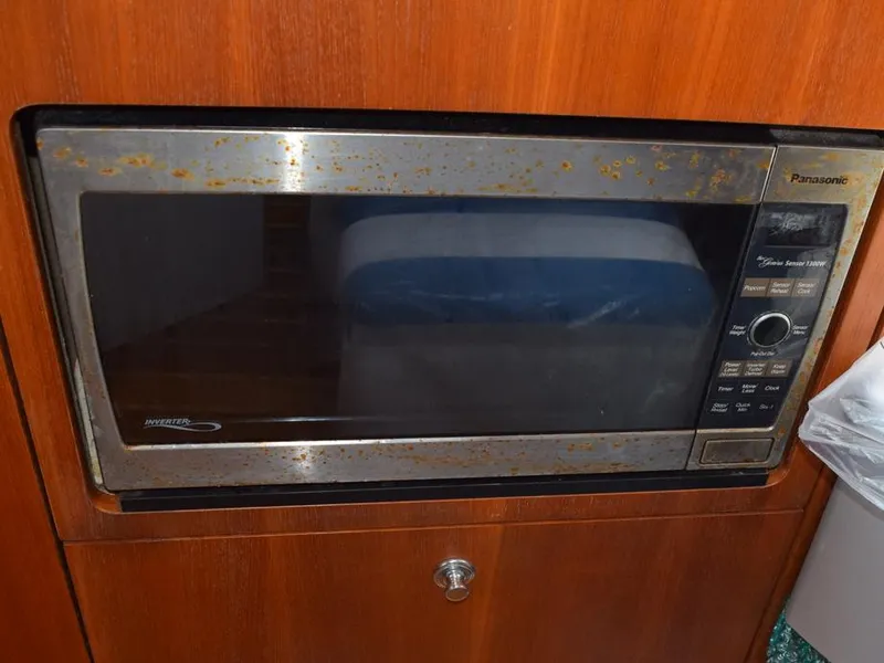 Slide: The Image of Rusty microwave in 2006 Tiara Yachts 3200 Open interior. - 46