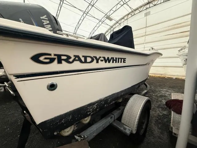 Slide: The Image of 2005 Grady-White 180 Sportsman boat on trailer in covered storage. - 4