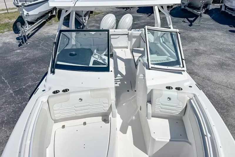 Slide: The Image of 2025 Edgewater 262CX Crossover boat with open deck and seating, viewed from above. - 33