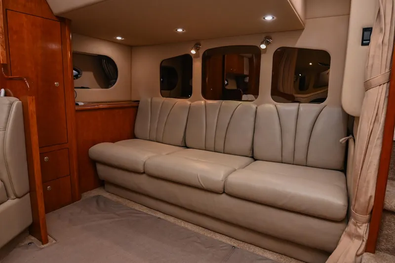 Slide: The Image of Luxurious interior of 2005 Cruisers Yachts 370 Express with beige leather seating. - 35