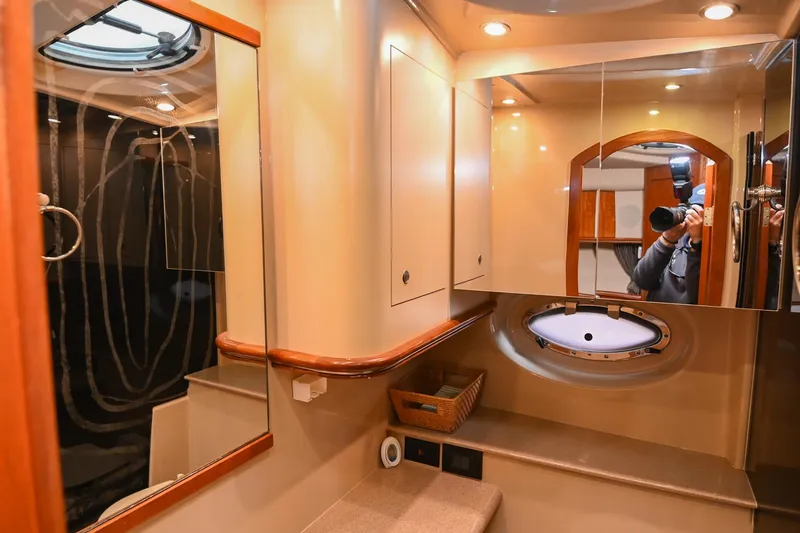 Slide: The Image of Luxurious bathroom interior of 2005 Cruisers Yachts 370 Express with modern fixtures. - 44