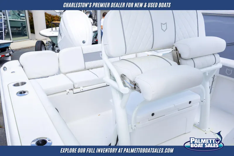 Slide: The Image of 2025 Sea Fox 228 Commander boat interior with cushioned seating and storage. - 16