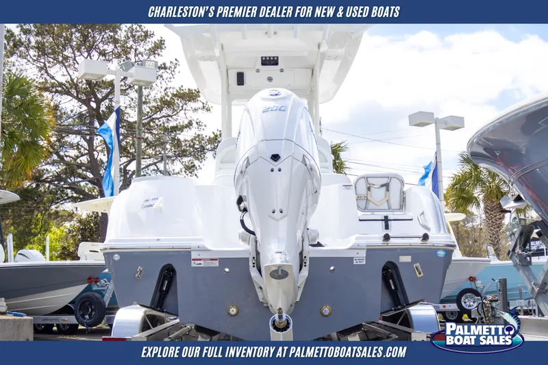 Slide: The Image of 2025 Sea Fox 228 Commander boat displayed at Palmetto Boat Sales dealership. - 6