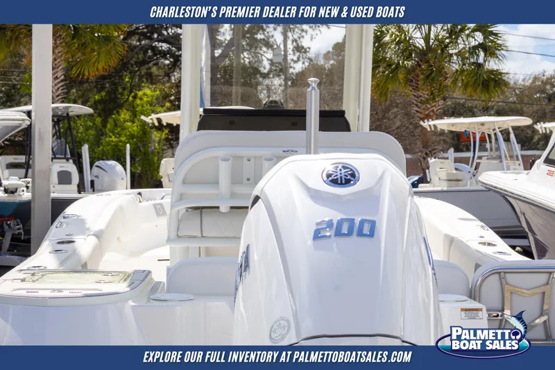 Slide: The Image of 2025 Sea Fox 228 Commander boat displayed at Palmetto Boat Sales dealership. - 8