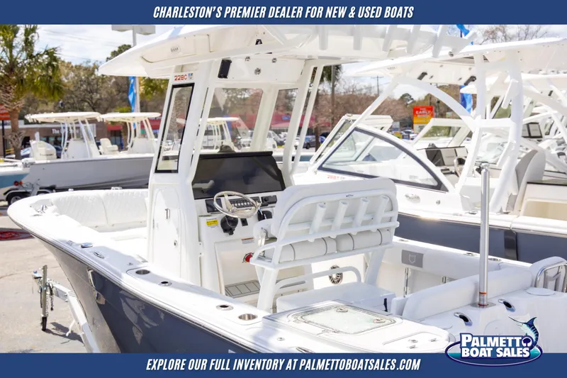 Slide: The Image of 2025 Sea Fox 228 Commander boat displayed at Palmetto Boat Sales dealership. - 9