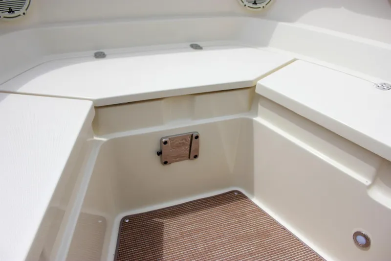 Slide: The Image of 2024 Chris-Craft Catalina 24 boat interior with seating and storage area. - 20