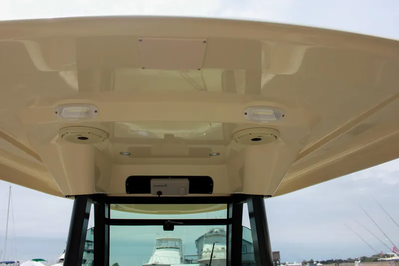 Slide: The Image of 2024 Chris-Craft Catalina 24 boat roof with integrated lighting and sleek design. - 26