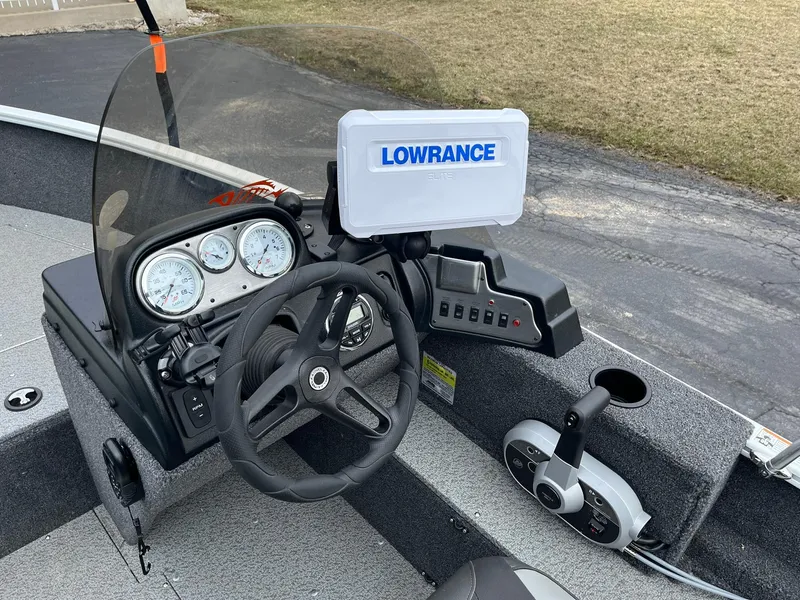 Slide: The Image of 2023 Lund 1650 Rebel XL SS boat dashboard with Lowrance navigation system. - 12