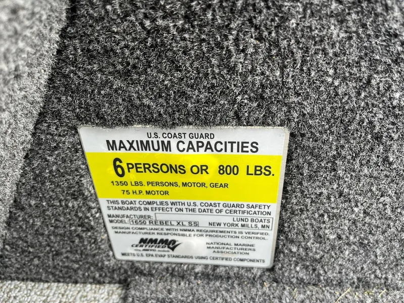Slide: The Image of 2023 Lund 1650 Rebel XL SS capacity label, 6 persons or 800 lbs, 75 HP motor. - 25