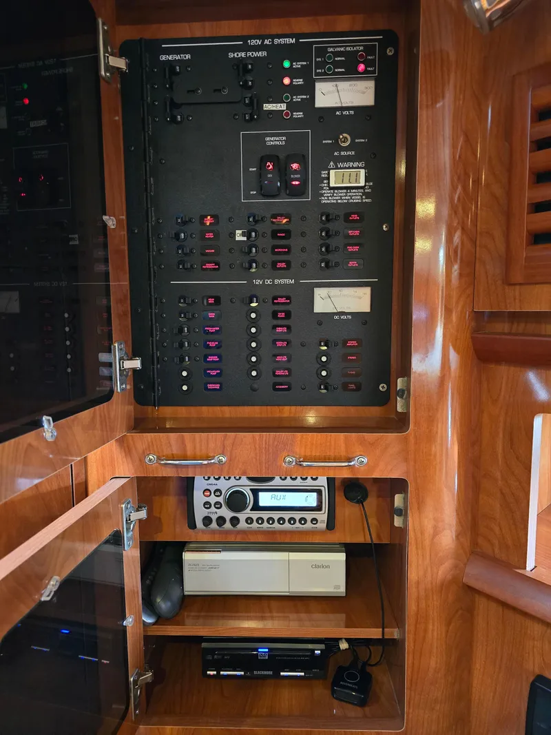 Slide: The Image of Electrical panel and radio system inside a 2007 Four Winns 358 Vista boat. - 10