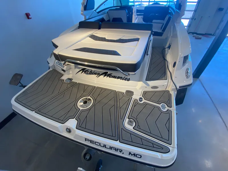 Slide: The Image of 2023 Monterey 298 Super Sport BR boat with spacious deck and seating, labeled "Making Memories." - 11