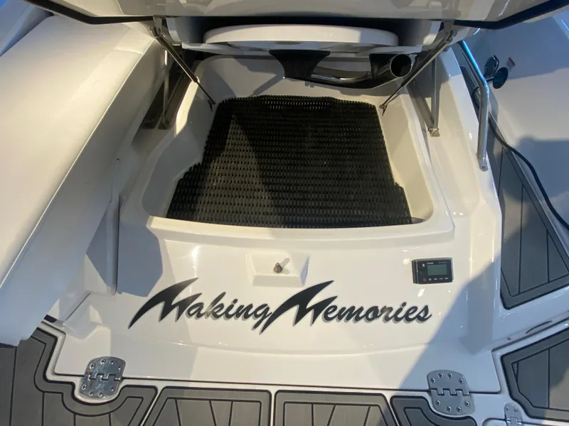 Slide: The Image of 2023 Monterey 298 SUPER SPORT BR boat with "Making Memories" text on the deck. - 12