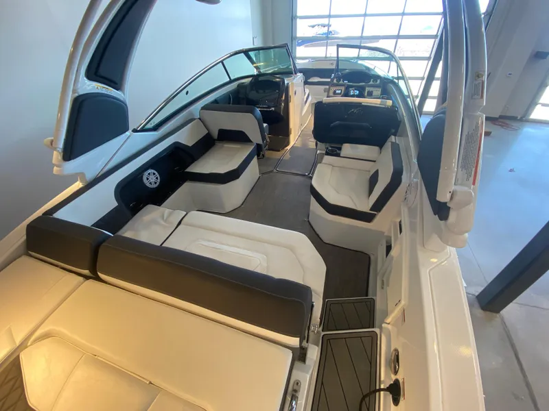 Slide: The Image of 2023 Monterey 298 Super Sport BR interior with sleek seating and modern dashboard. - 14