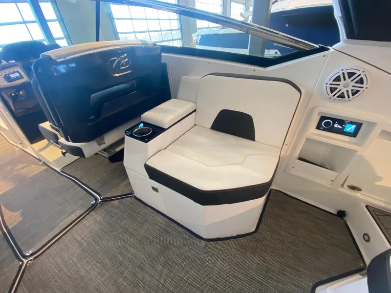 Slide: The Image of 2023 Monterey 298 SUPER SPORT BR interior with modern seating and sleek design. - 17