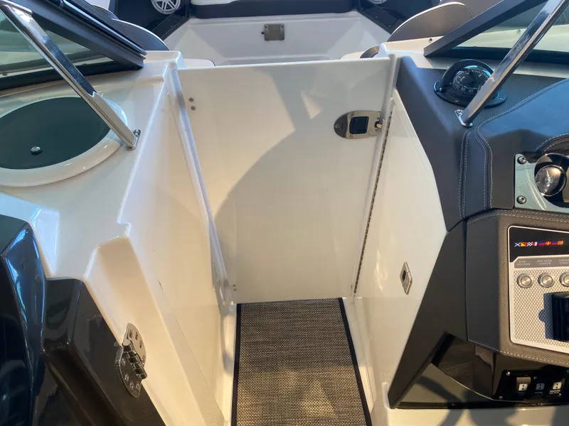 Slide: The Image of 2023 Monterey 298 SUPER SPORT BR boat interior with sleek dashboard and modern controls. - 38