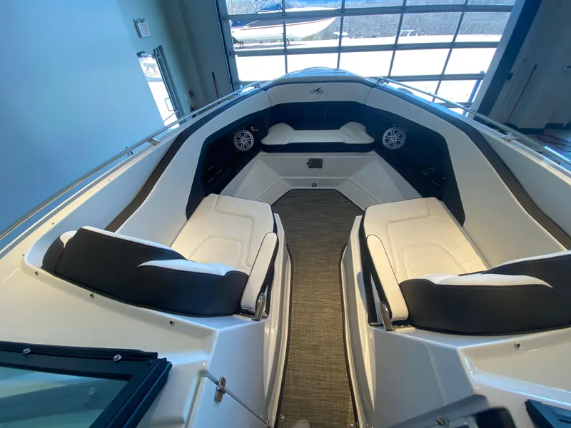 Slide: The Image of 2023 Monterey 298 SUPER SPORT BR boat interior with sleek seating and modern design. - 43