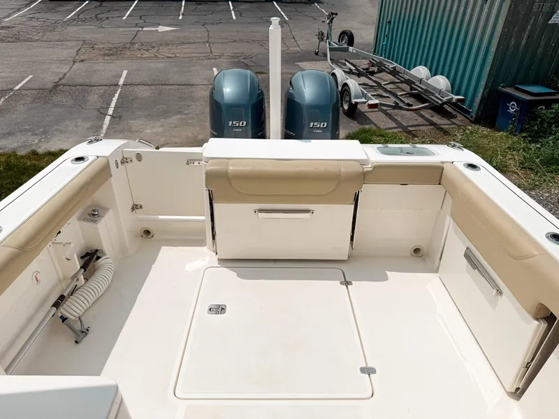 Slide: The Image of 2020 Pursuit DC 266 Dual Console boat with twin 150 engines, spacious deck, and storage. - 9