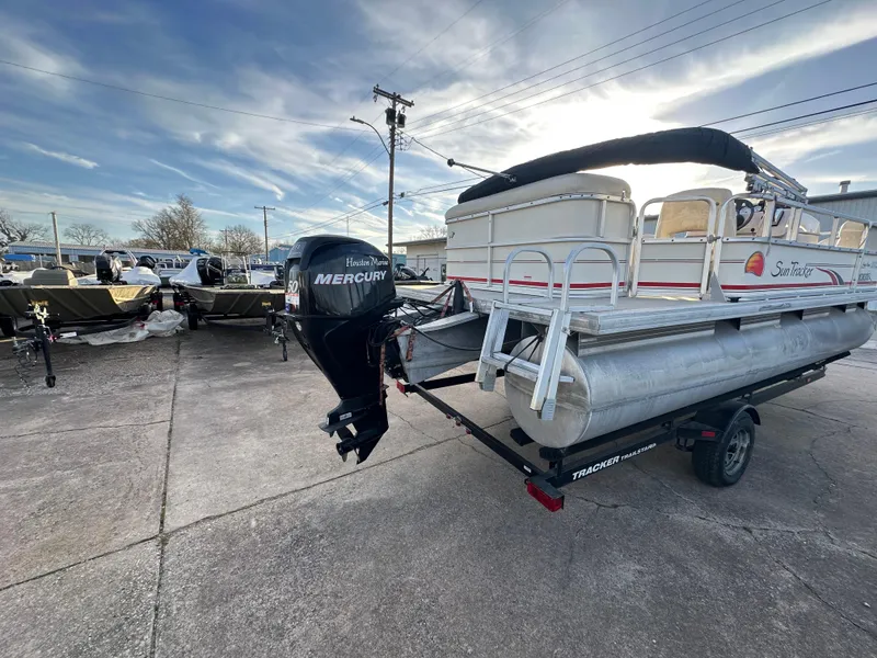 Slide: The Image of 2009 Sun Tracker PARTY BARGE 200 Classic pontoon boat with Mercury outboard motor on trailer. - 4