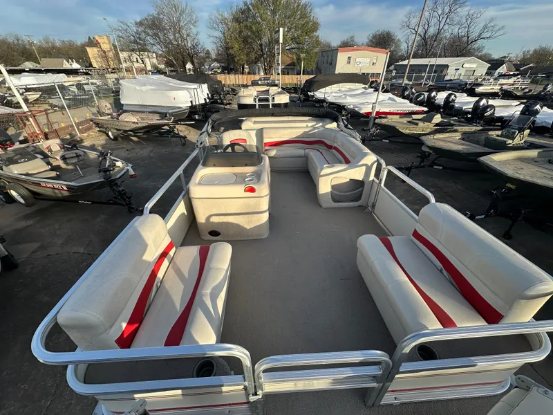 Slide: The Image of 2009 Sun Tracker PARTY BARGE 200 Classic pontoon boat with spacious seating and red accents. - 8
