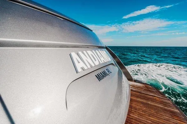 Slide: The Image of Luxury Pershing 70 yacht cruising on ocean, rear view, 2015 model. - 22