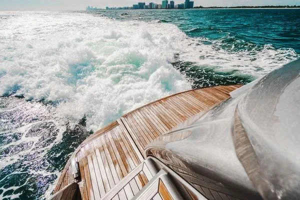 Slide: The Image of Luxury Pershing 70 yacht cruising through ocean waves, 2015 model. - 23