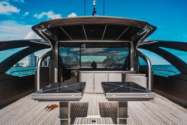 Slide: The Image of Luxurious 2015 Pershing 70 yacht deck with sleek design and ocean view. - 32