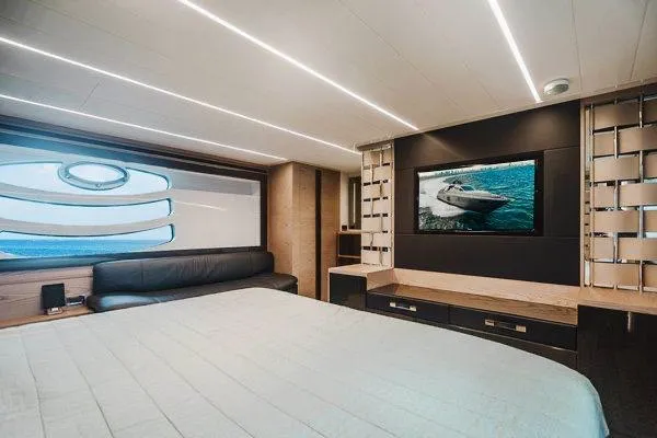 Slide: The Image of Luxurious interior of a 2015 Pershing 70 yacht with modern design and elegant furnishings. - 49