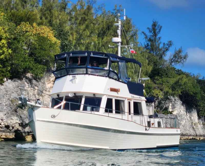 The Image of Grand Banks 42 Classic yacht from 2000 on calm waters. - 0