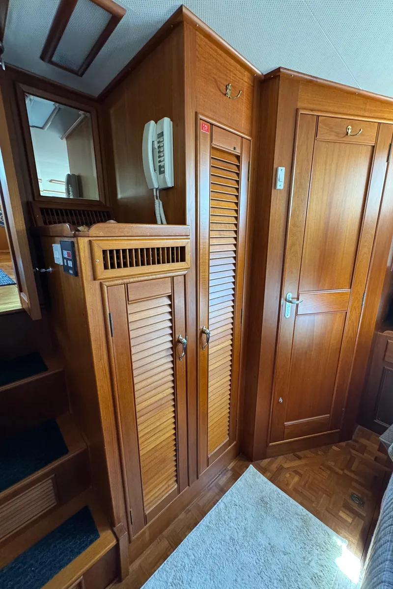 Slide: The Image of Interior of 2000 Grand Banks 42 Classic yacht with wooden cabinetry. - 16