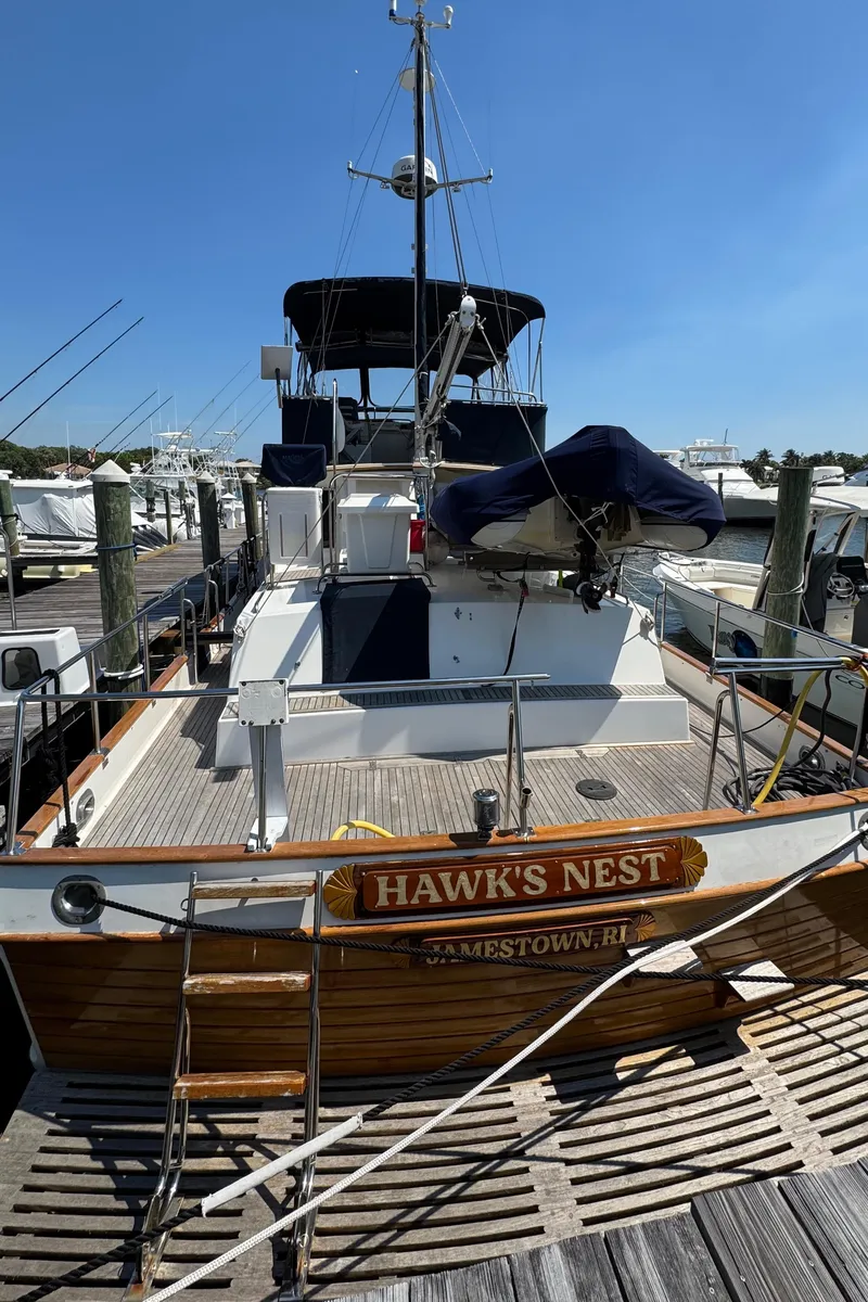 Slide: The Image of Grand Banks 42 Classic yacht from 2000 docked at harbor. - 33