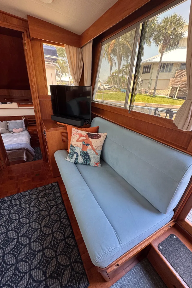 Slide: The Image of Interior of 2000 Grand Banks 42 Classic yacht with sofa and TV. - 6