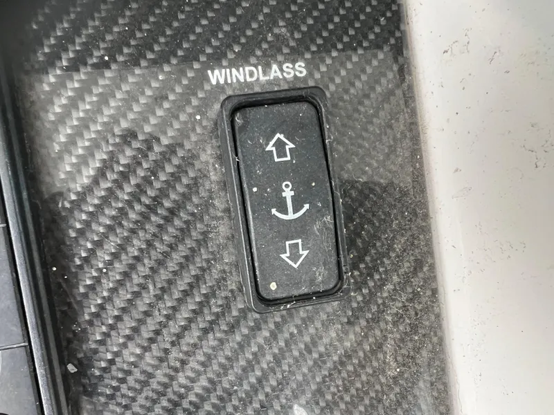 Slide: The Image of Windlass control switch on 2019 Fountain 39 NX boat dashboard. - 11