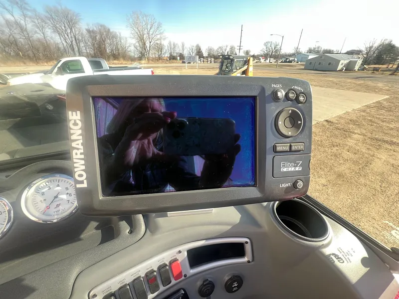Slide: The Image of Lowrance Elite-7 CHIRP fishfinder on 2014 Lund 1875 Crossover XS dashboard. - 14
