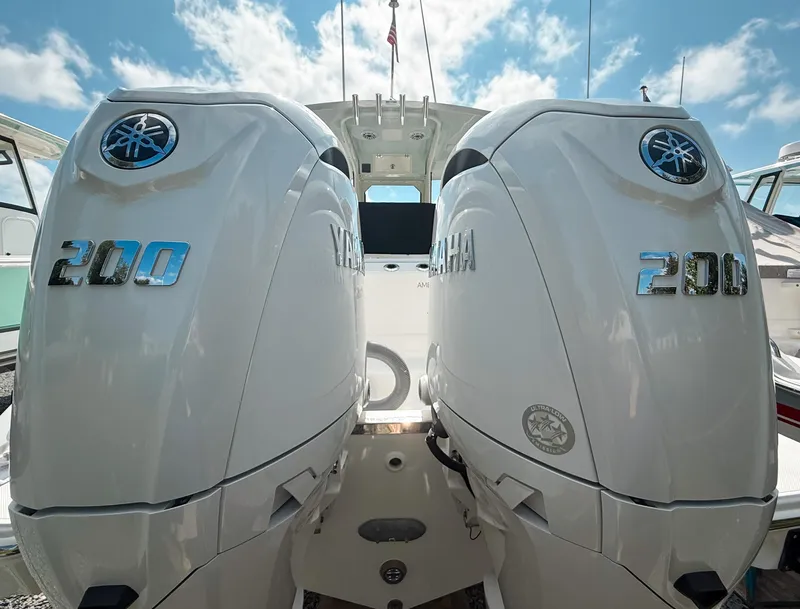 Slide: The Image of Twin Yamaha outboard engines on a 2025 Pursuit S 268 Sport boat. - 7