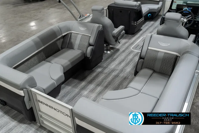 Slide: The Image of 2025 Bennington 22 MFB pontoon boat interior with luxurious gray seating and modern design. - 11