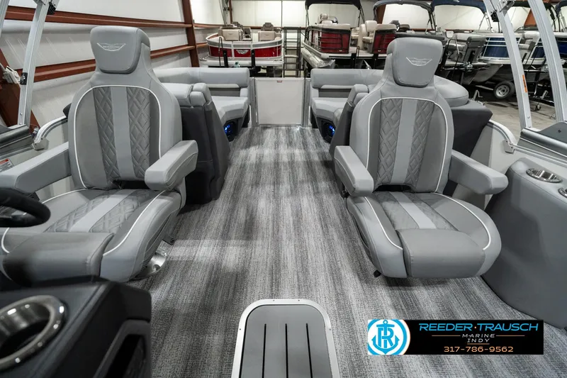 Slide: The Image of 2025 Bennington 22 MFB boat interior with luxurious gray seating and modern design. - 14