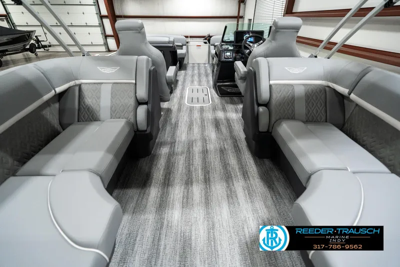 Slide: The Image of 2025 Bennington 22 MFB pontoon boat interior with gray seating and modern design. - 16