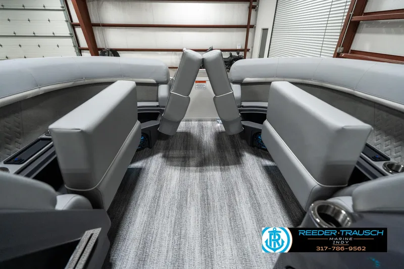 Slide: The Image of 2025 Bennington 22 MFB boat interior with gray seating and carpet flooring. - 19