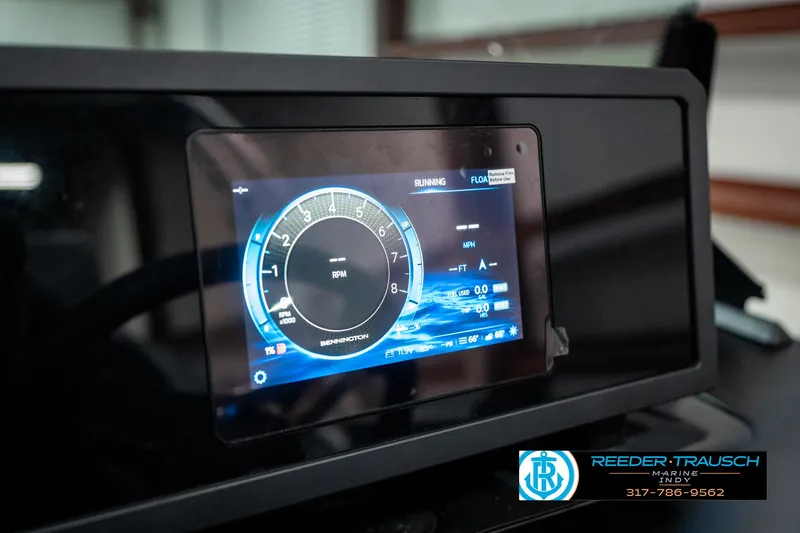 Slide: The Image of Dashboard display of 2025 Bennington 22 MFB boat with digital RPM gauge. - 31
