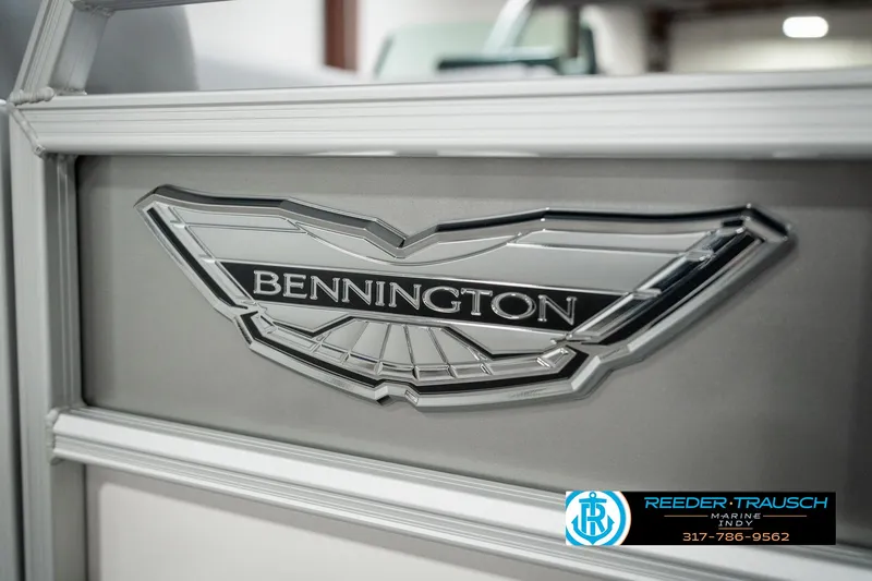 Slide: The Image of 2025 Bennington 22 MFB logo on a sleek metallic surface, Reeder-Trausch Marine branding. - 40