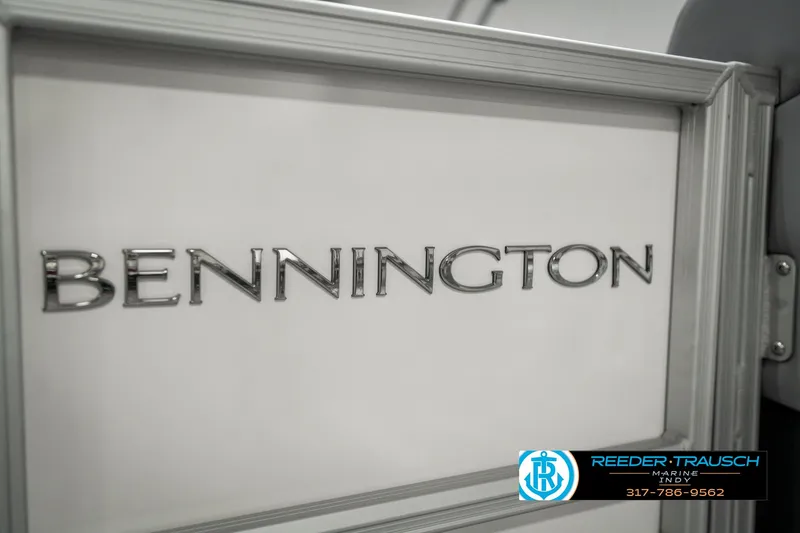 Slide: The Image of 2025 Bennington 22 MFB boat logo on a sleek metallic surface. - 43