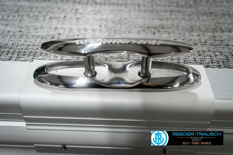 Slide: The Image of 2025 Bennington 22 MFB boat cleat with Reeder-Trausch Marine logo. - 47