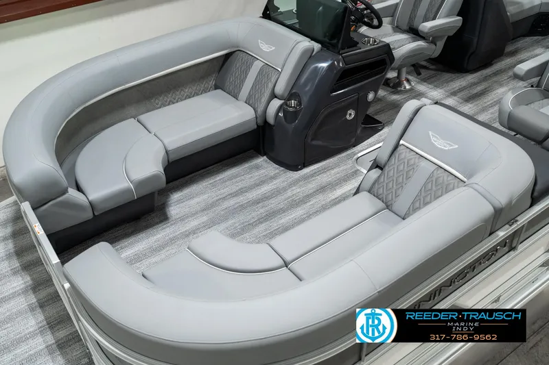 Slide: The Image of 2025 Bennington 22 MFB pontoon boat interior with luxurious gray seating and modern design. - 9
