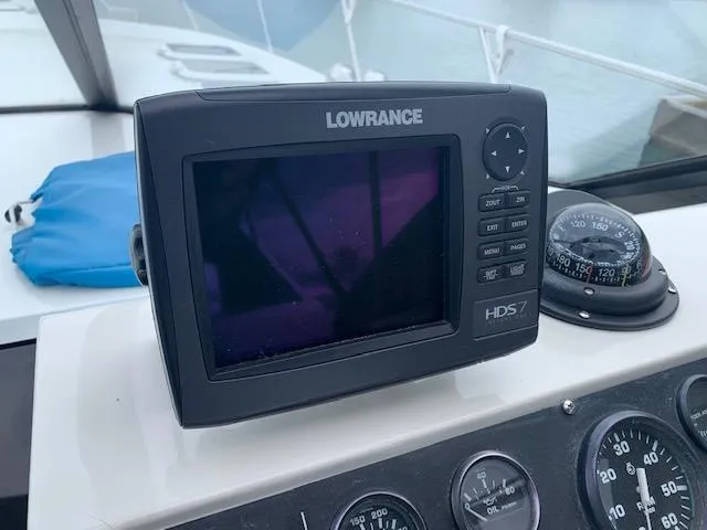 Slide: The Image of Lowrance HDS-7 marine GPS on 1994 Silverton 34 Express dashboard. - 14